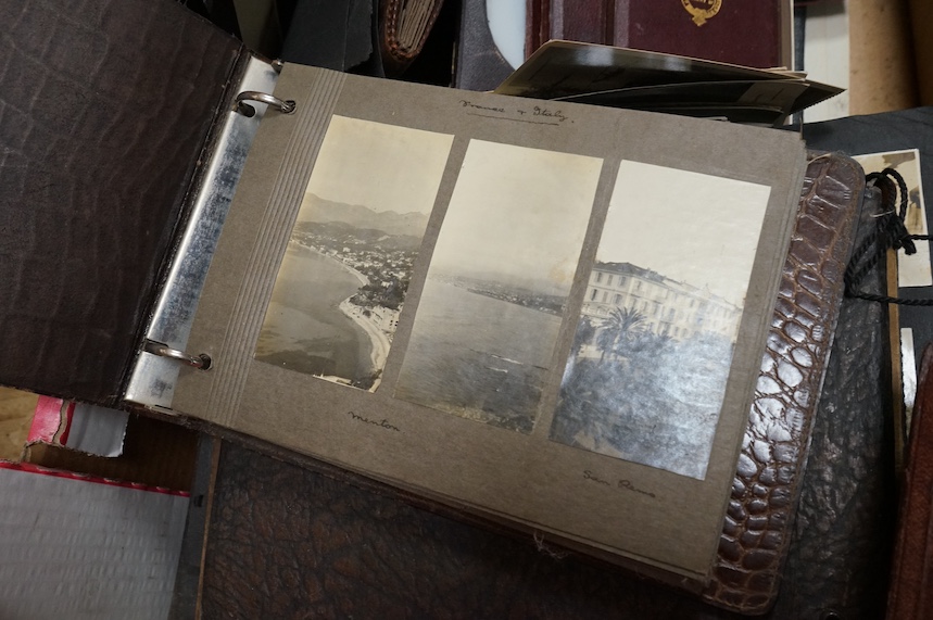 A collection of albums of early to mid 20th century photos, including small group of Daguerreotype and Ambrotypes, a carte postal of King Edward VIII with topographical carte postal, a Beagles postcard of a Blazing Airsh